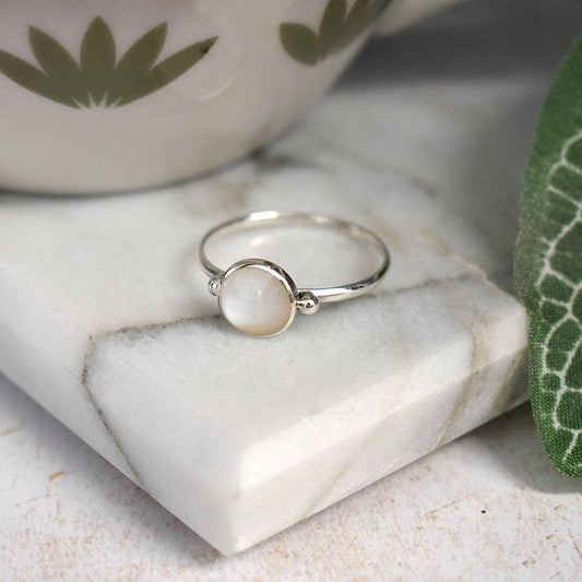 Bronwen round mother of pearl with ball detail ring: 52