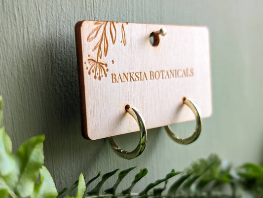 Gold Twisted Hoop Huggie Earrings